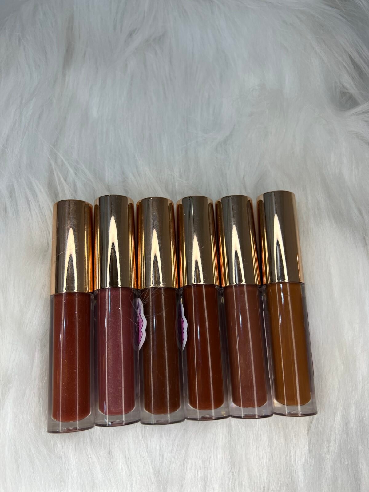 ⁦Brown lipgloss⁩ - الصورة ⁦1⁩